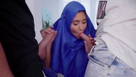 Busty hijab lady Aysha rides one cock while giving a sensual blowjob