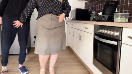 Horny mother-in-law sucks and masturbates in the kitchen and gets a load of cum on her gorgeous ass