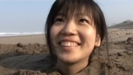 Girl Buried In Beach